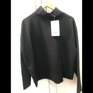 Black mock neck kit and ace long sleeved top